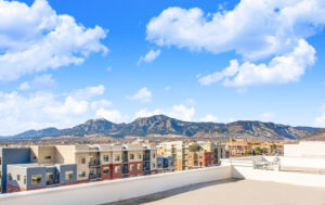 Exterior View from the roof of Depot Square with the city and mountains in the background, Photo taken on a sunny day.